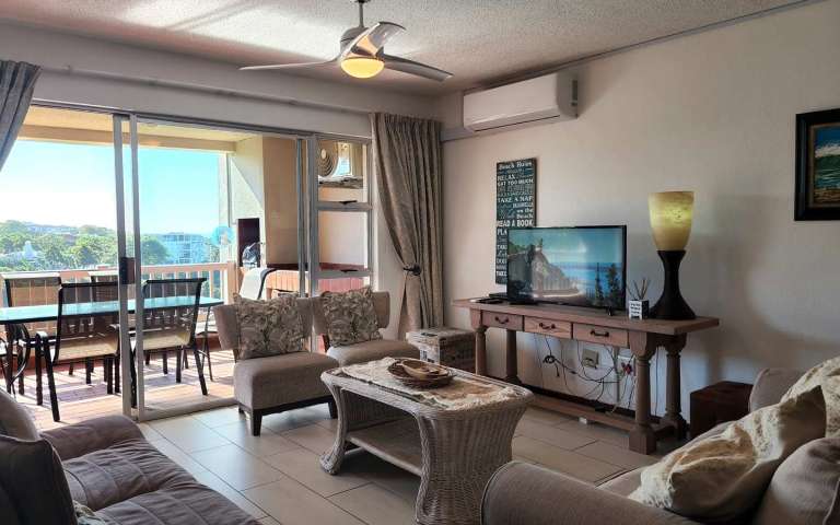 Uvongo holiday seafront South Coast Laguna la Crete 70 self catering accommodation happy holiday homes lounge 768x480